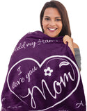 Woman covered by the I Love You Mom blanket 